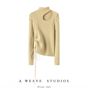 狂赞有魅力~镂空抽绳针织羊绒衫女秋冬新款半高领泡泡袖上衣