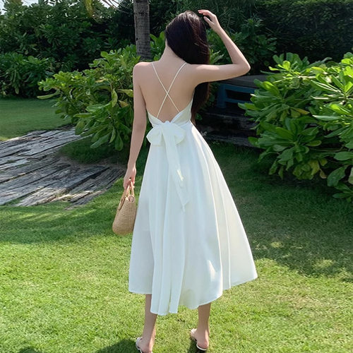 吊带露背连衣裙女夏三亚旅行穿搭网红白色仙女裙子海边度假沙滩裙