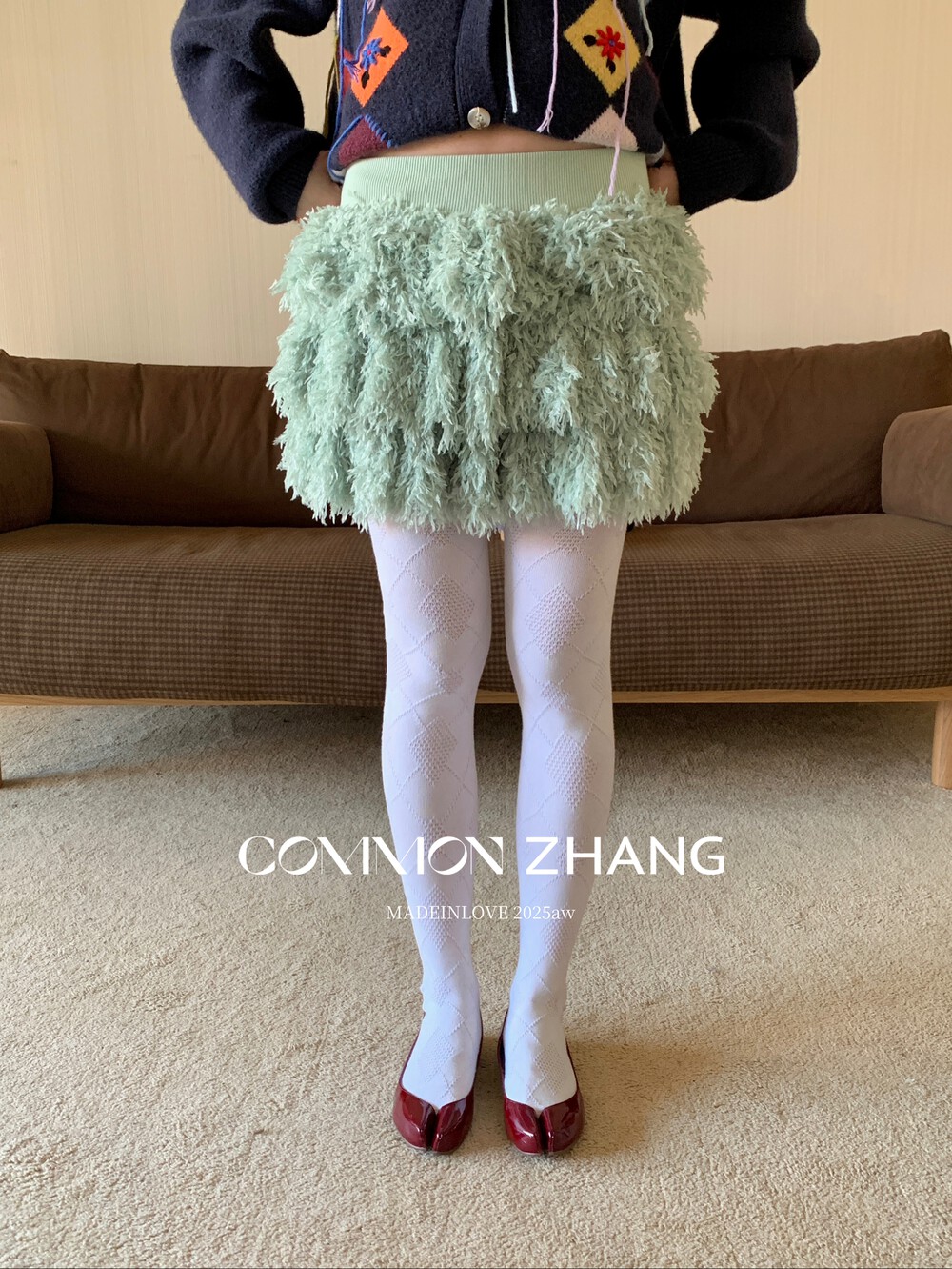 十三行正版2025冬季新款韩版时尚法式百搭毛绒叠层A字蛋糕半身裙