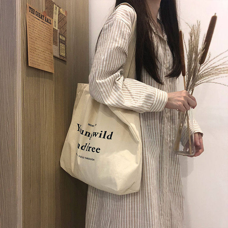 慵懒风帆布包包女2026新款单肩文艺小清新学生通勤包购物袋手提包