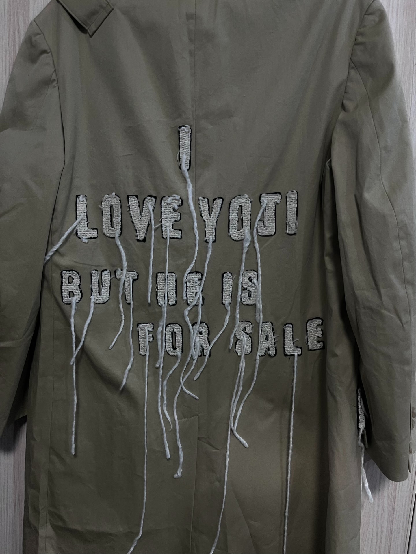 Yohji Yamamoto Beige Slogan Fringe Coat — label