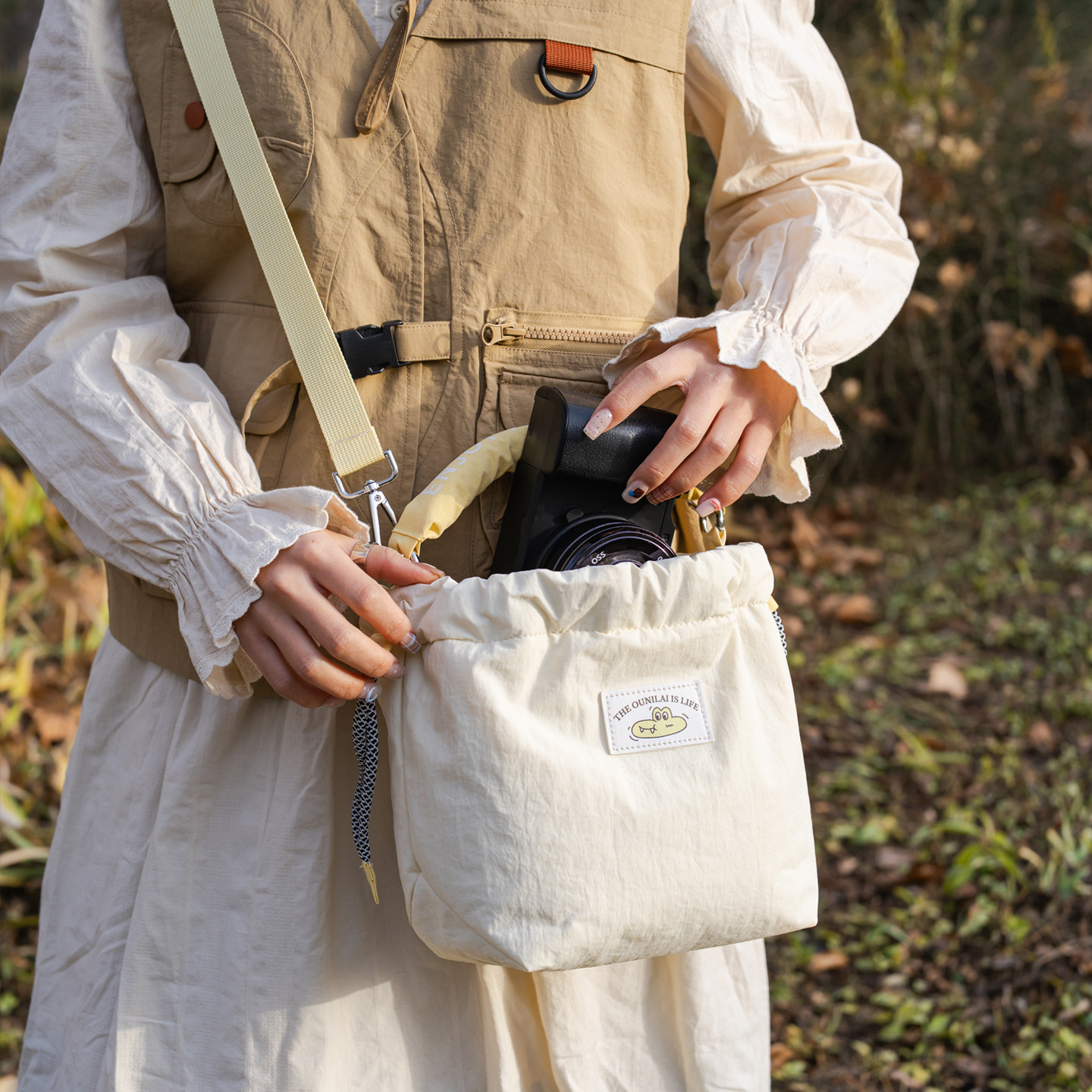 日系文艺单肩微单相机包女生斜挎包手提摄影包便携出游抽绳水桶包,箱包皮具/热销女包/男包,水桶包,淘宝优惠券,粉丝福利购,淘宝优惠卷