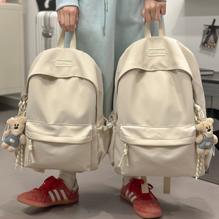 书包女生初中学生高中大学生纯色百搭大容量双肩包轻便出游小背包