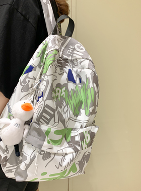 涂鸦印花双肩包女2025新款夏韩版潮流休闲背包男高中大学生书包女