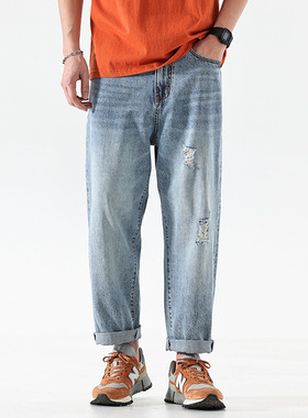 春季新款火爆潮流水洗磨烂浅蓝色宽松直筒牛仔裤