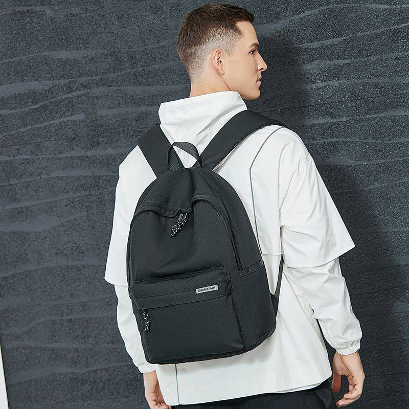 潮牌双肩包男士简约书包男初中高