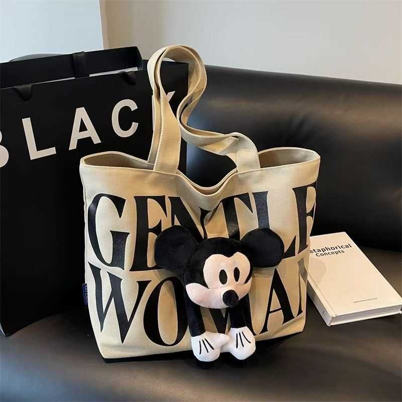 帆布包包女2025新款卡通米奇大容量托特包大学生上课通勤单肩包女