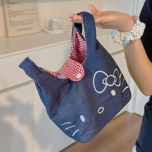 可爱卡通牛仔包包手腕包帆布包2025新款 手提包化妆包外出便携收纳