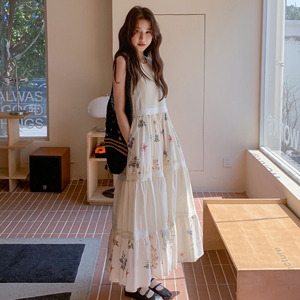 松弛感文艺风米白色无袖连衣裙女夏2025超火好看慵懒减龄背心长裙图片
