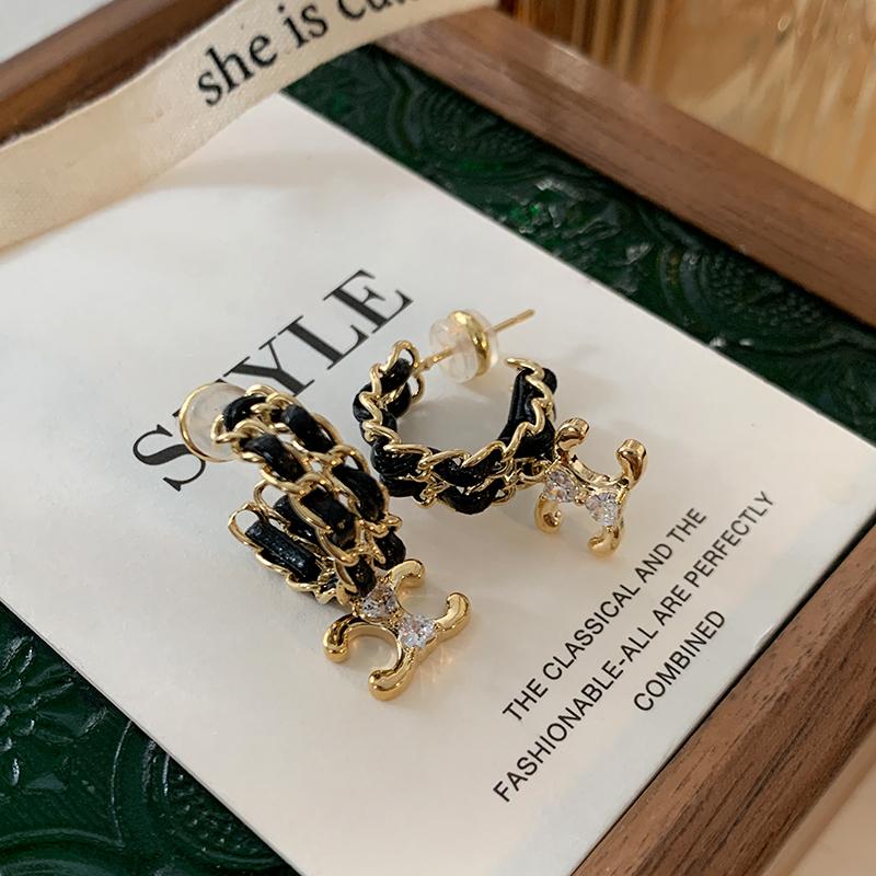 凯旋门耳环黑色皮质耳钉女