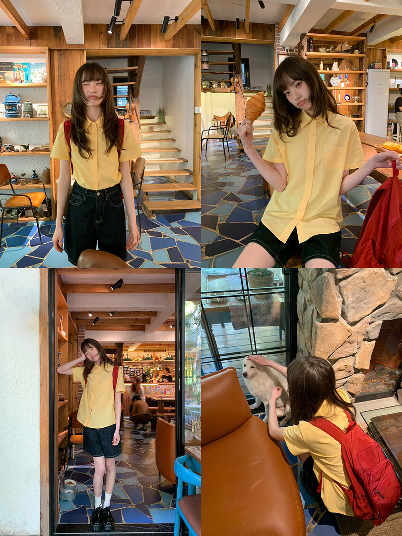 Yellow short-sleeve button-up shirt worn with black shorts and a red backpack