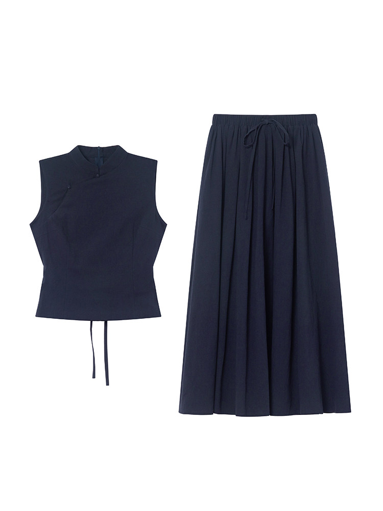Navy sleeveless top and matching long skirt laid flat on a white background