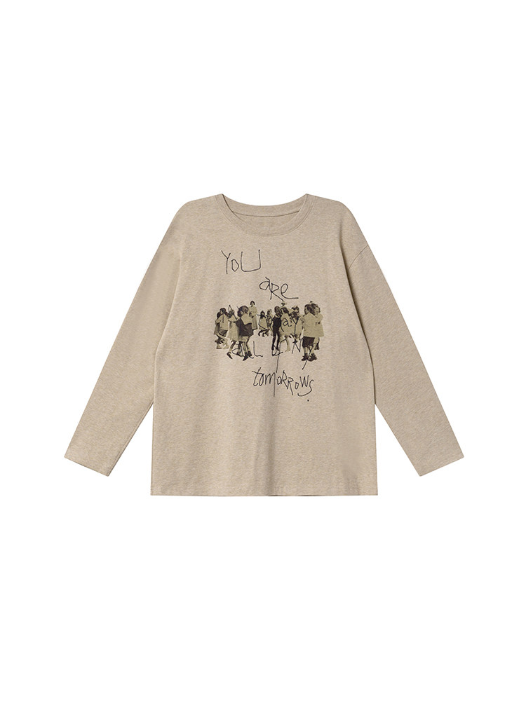 Beige long-sleeve graphic shirt on a white background