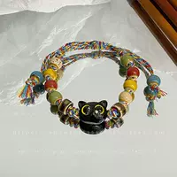 Цветная тканая кошка