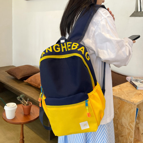 书包女大学生2023新款韩版可爱撞色少女粉校园小背包初高中双肩包