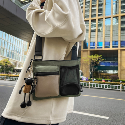 INS机能工装风男女斜挎包轻便百搭拼色包包单肩小背包山系挎包男