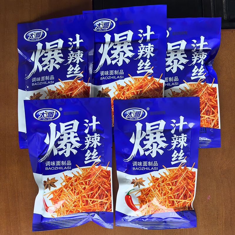 太哥18g爆汁辣丝辣条解馋麻辣零食80后童年怀旧校园零食