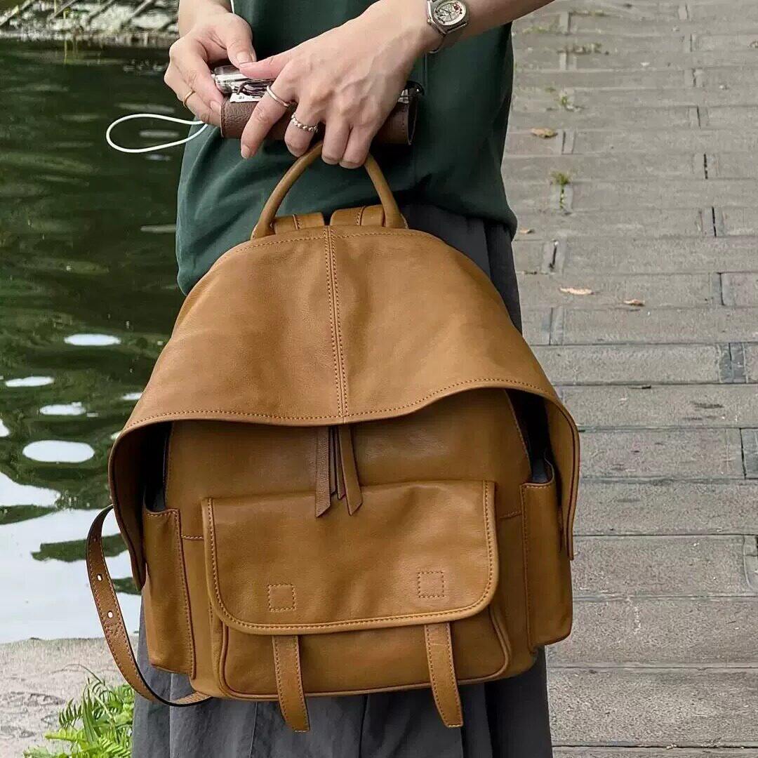 裘植羊皮行云双肩包植鞣大容量休闲户外通勤复古男女同款真皮背包