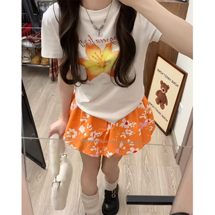 田园风热情橘花南瓜花苞短裙2025夏季 a字小众设计橘色半身裙 新款