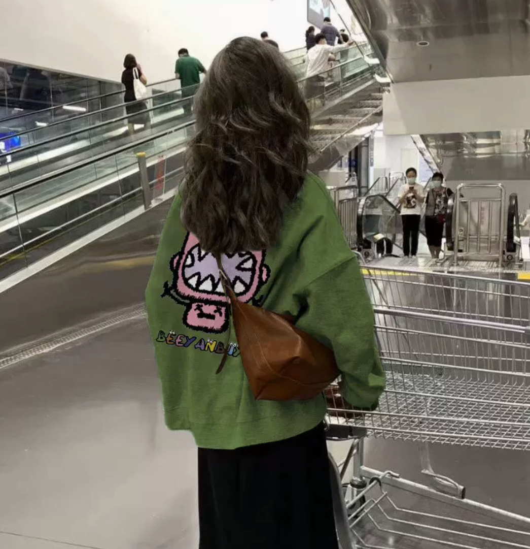 高级感绿色卡通印花慵懒卫衣女秋