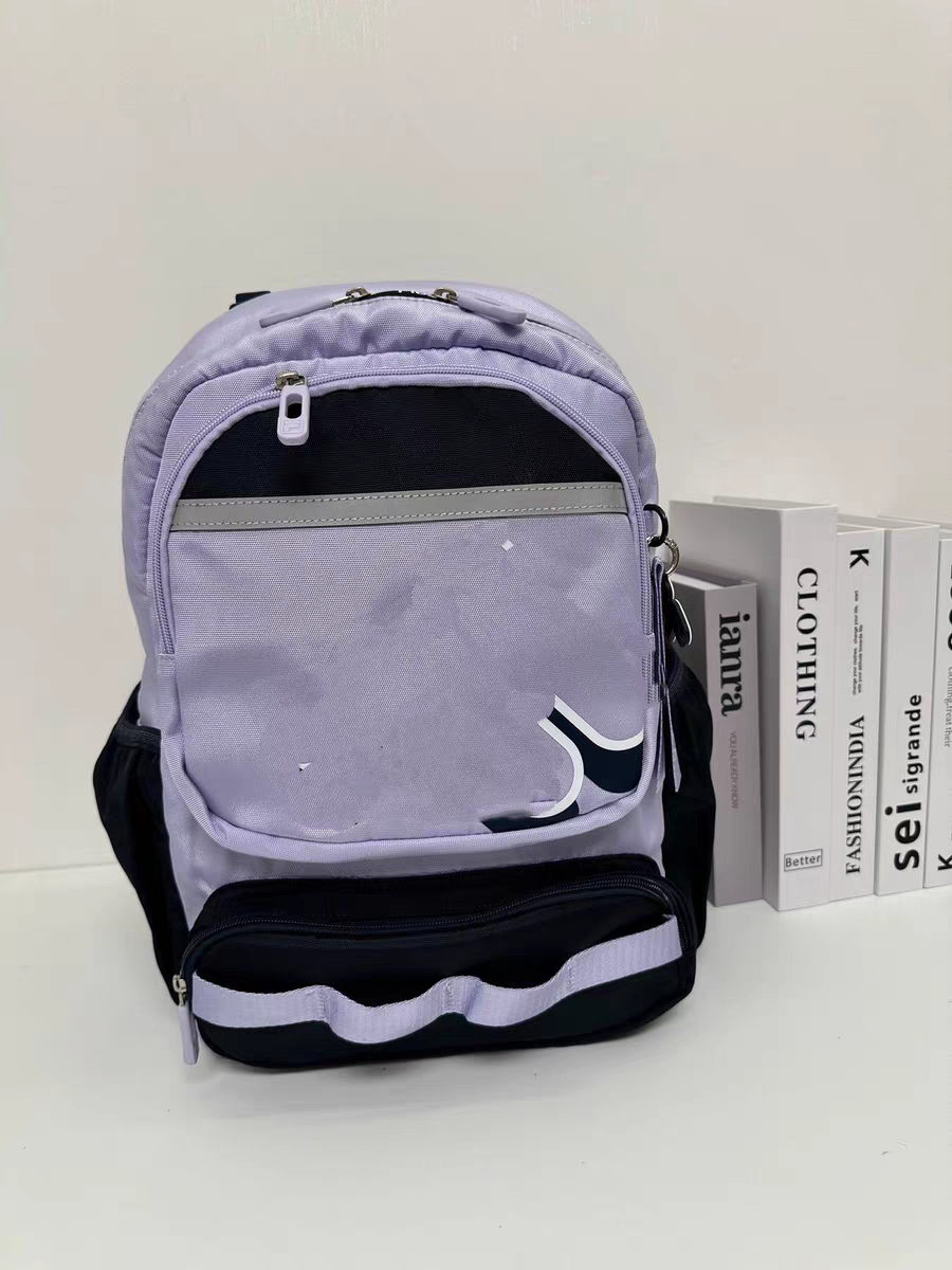 休闲防水儿童书包3-6年级小学生双肩包护脊减压旋转纽扣调节背带