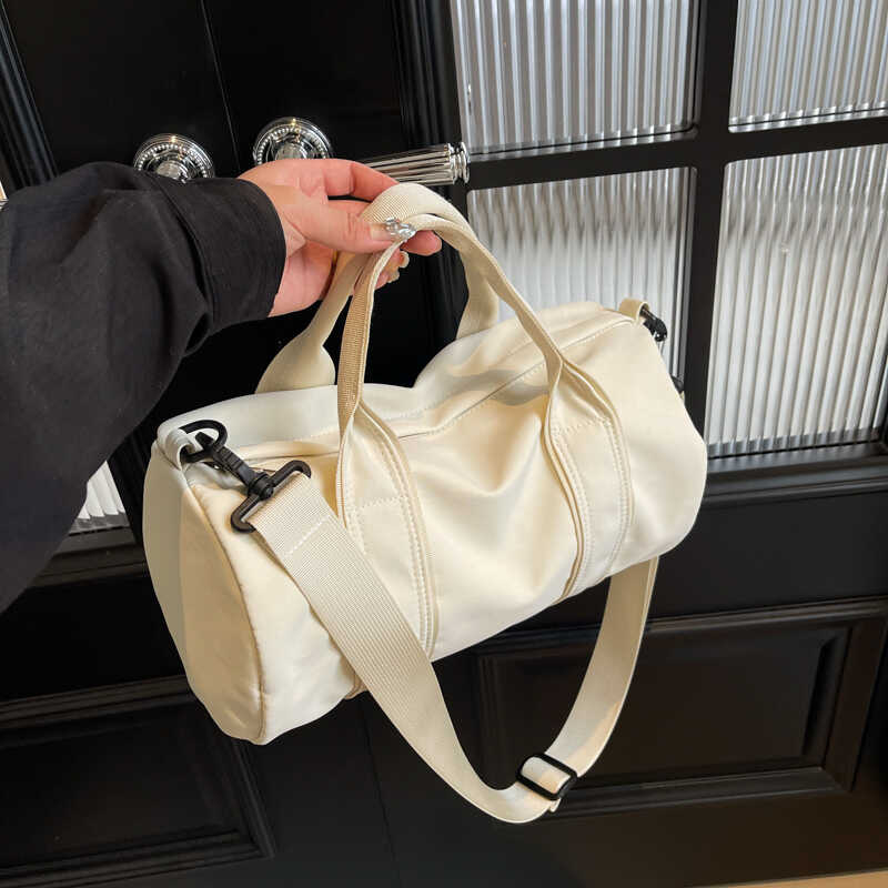 瑜伽包包运动斜挎女圆筒包