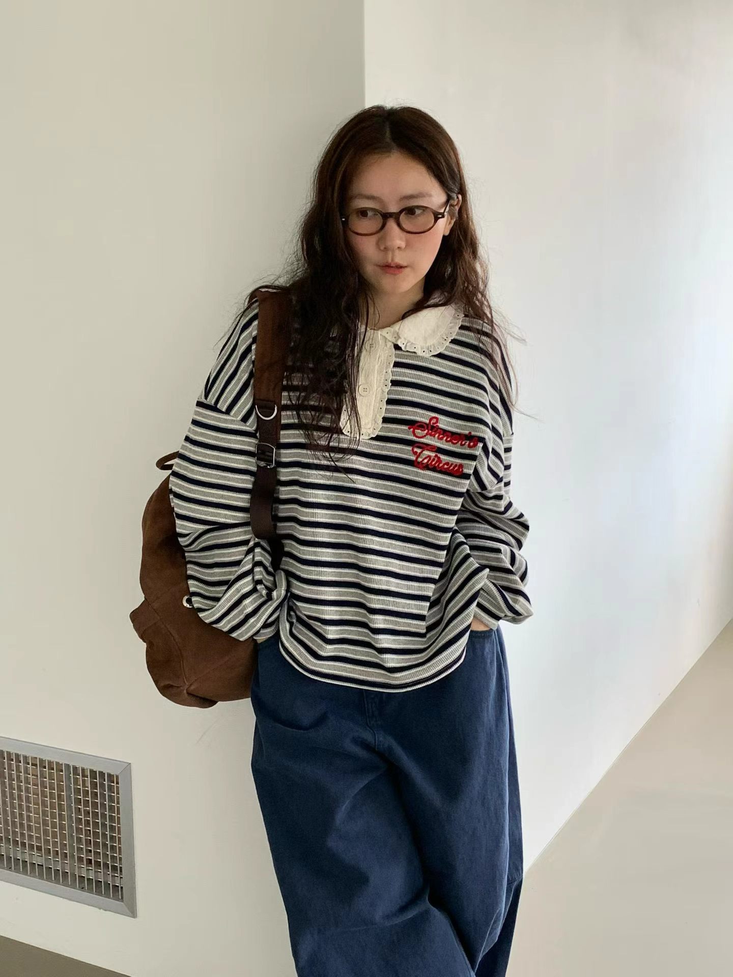 韩国东大门正品女装2026秋季百搭显瘦条纹长袖宽松蕾丝娃娃领卫衣