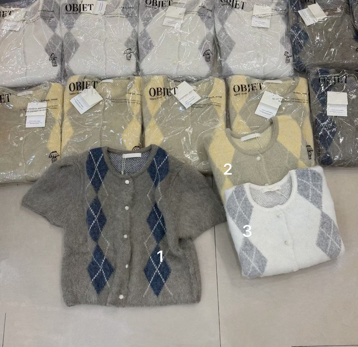 韩国东大门正品2026秋季百搭显瘦圆领泡泡短袖拼色菱格针织开衫女