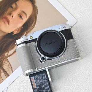 适用富士xm5手柄保护套x100vi手柄皮套相机包肩带底座壳配件真皮