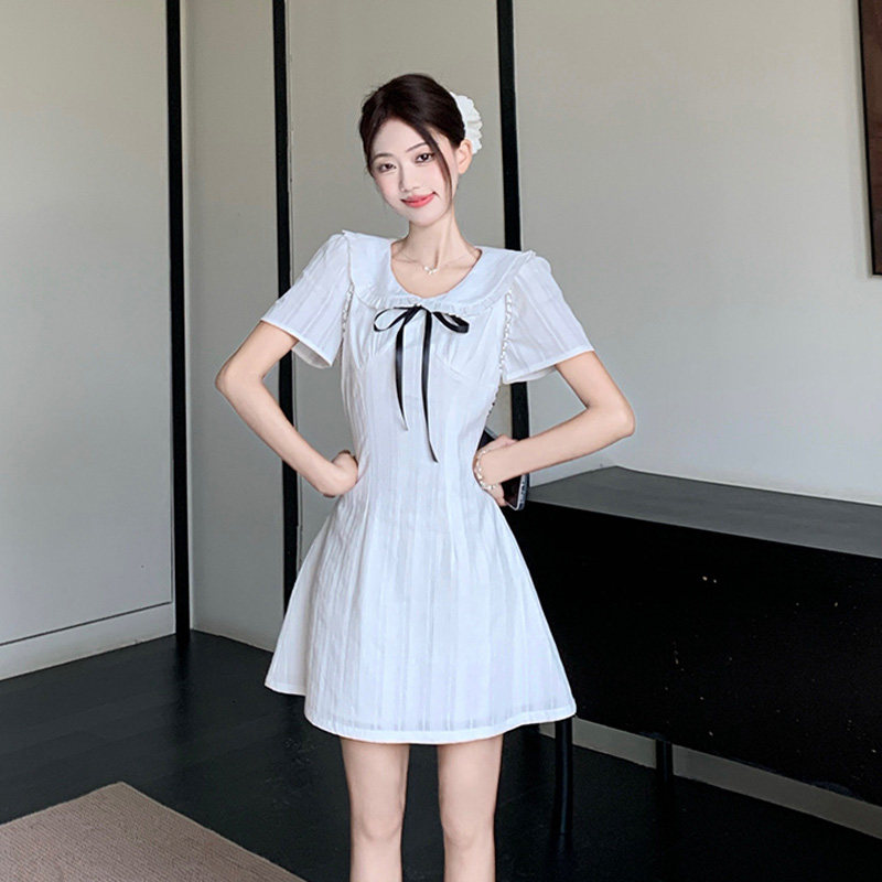 2026夏季赫本风小白裙短袖连衣裙仙女短裙收腰裙娃娃领蝴蝶结正肩