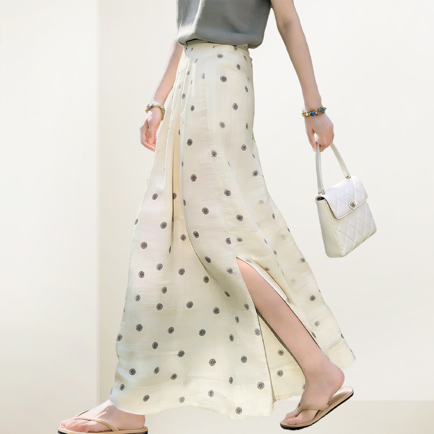 QOOEL洋气波点半身裙女2026春夏新款高腰显瘦开叉气质度假风长裙