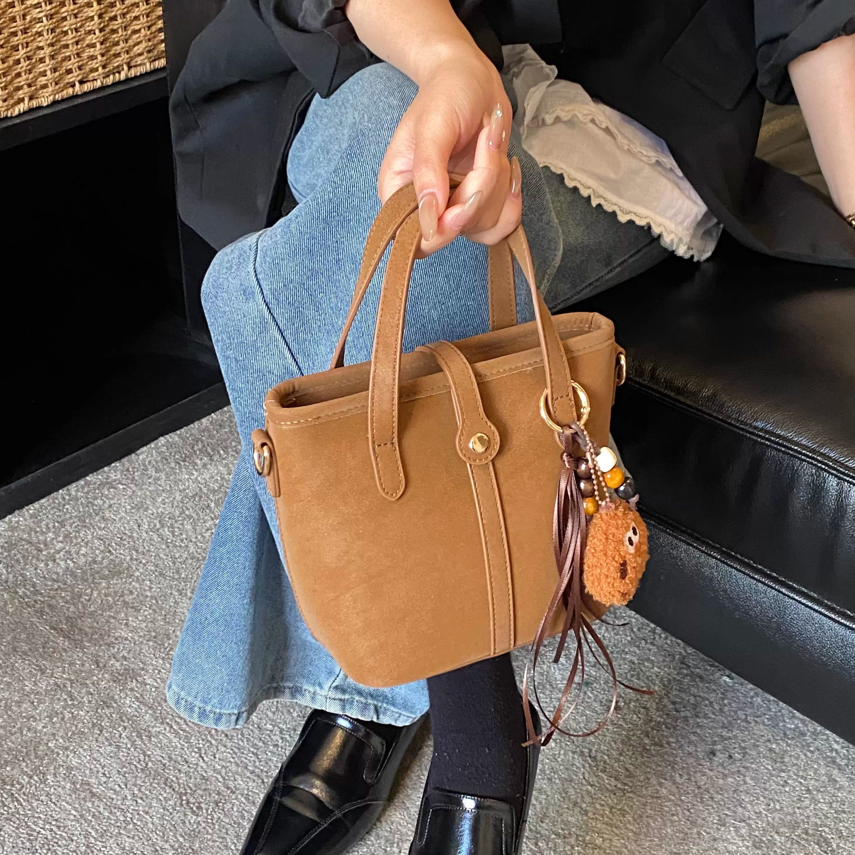 美拉德棕色复古绒面水桶包女2025新款百搭手提单肩托特包高级感,箱包皮具/热销女包/男包,水桶包,淘宝优惠券,粉丝福利购,淘宝优惠卷