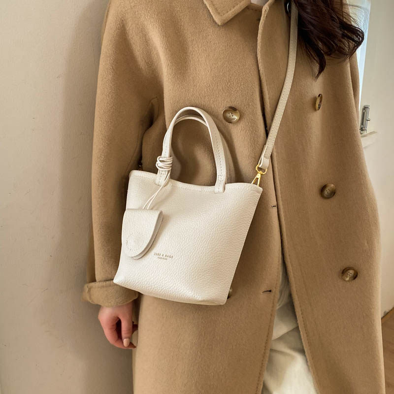 超火手拎水桶包包女2025新款简约百搭高级感菜篮子包托特包斜挎包,箱包皮具/热销女包/男包,水桶包,淘宝优惠券,粉丝福利购,淘宝优惠卷