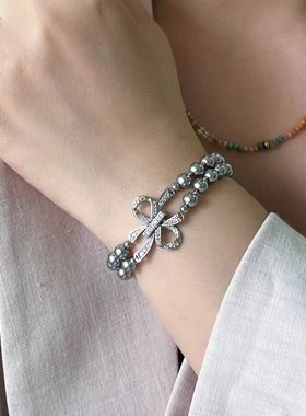 双层叠戴人造海水珍珠手链女蝴蝶结卡扣手串女轻奢小众精致轻奢