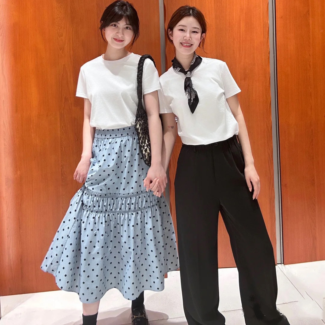 浪漫时髦淡人抽褶拼接波点长裙