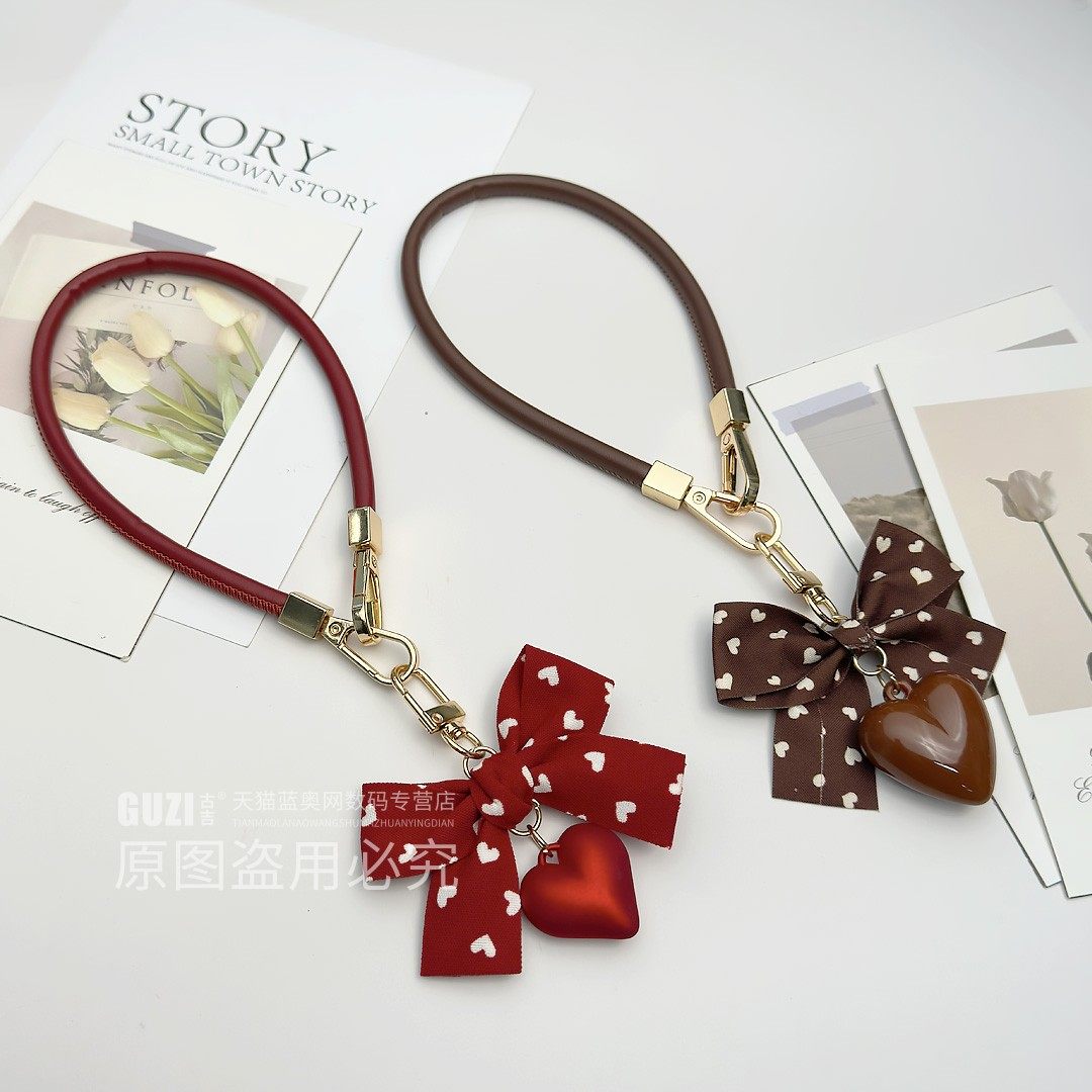精致爱心蝴蝶结手机挂绳高端皮质手腕绳带垫片防丢防盗手机链个性创意手提挂链气质时尚包包钥匙扣链条短款女,3C数码配件,手机挂件/手机链,淘宝优惠券,粉丝福利购,淘宝优惠卷