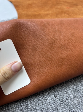 H193进口头层橙色荔枝纹印花牛皮厚度1.6mm手感微软15平方英尺*8