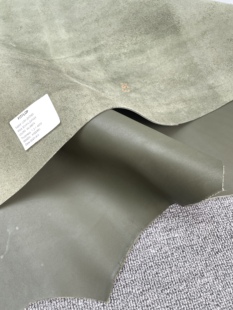 H917厚度1.8mm进口头层橄榄绿色平纹牛皮 皮面有小洞 手感中挺