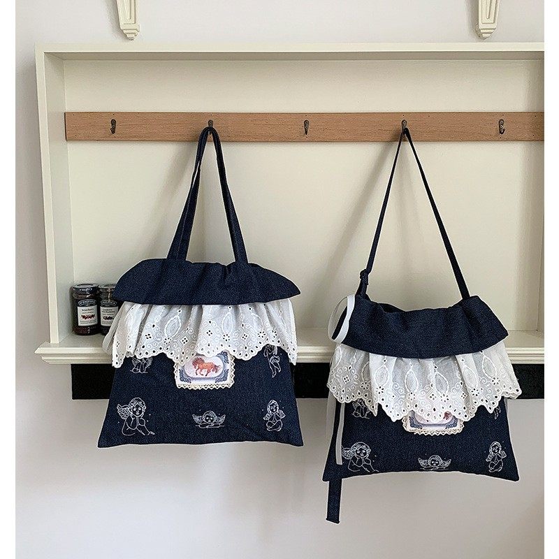 秋冬新品小众设计款抽绳包单肩斜挎花边韩系浪漫ins风牛仔通勤包