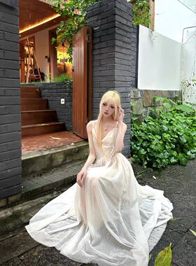 白色法式蝴蝶结吊带连衣裙女2024新款高级感气质度假风网纱长裙子