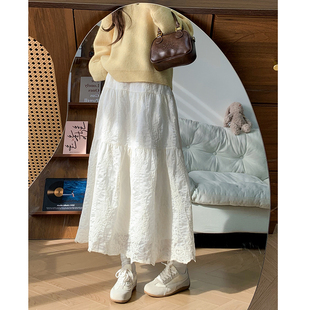 白色温柔风半身裙女秋冬2025新款提花蕾丝加绒加厚蓬蓬蛋糕长裙子