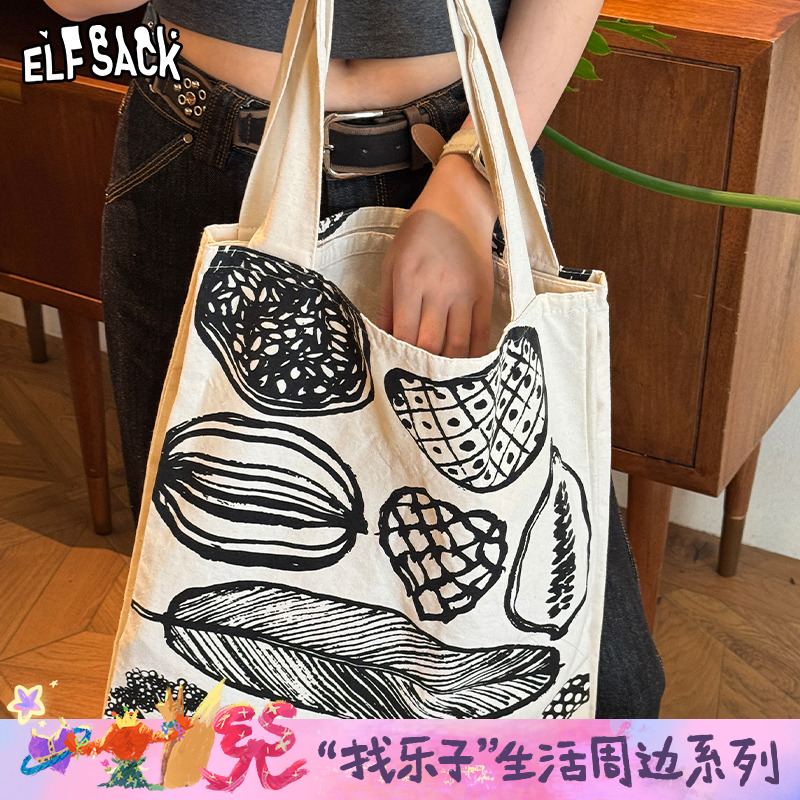 妖精的口袋黑白花卉单肩帆布包2025年新款大容量通勤独特手提包