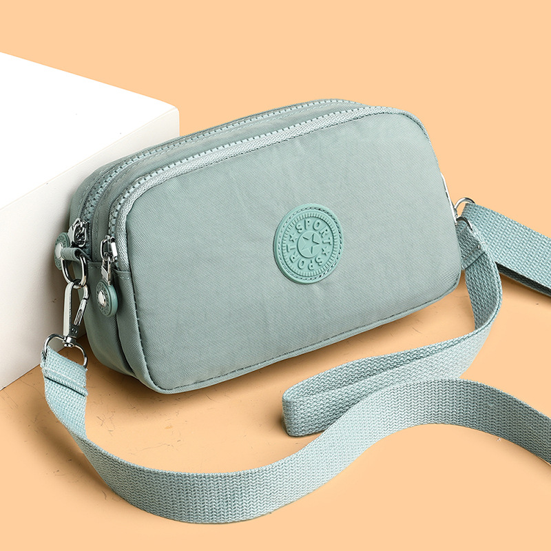 帆布包包女多层手机包2024新款牛津布轻便小方包百搭多用手拎包潮