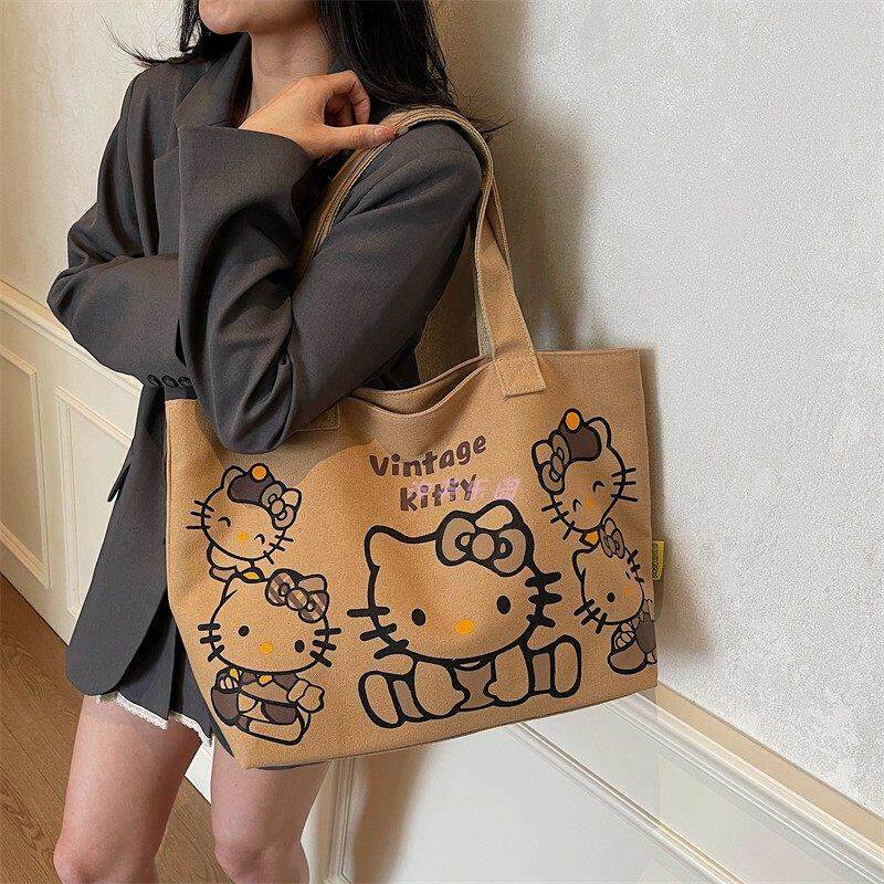 日本正版kitty帆布包新款休闲通勤单肩托特包妈咪包外出购物袋潮