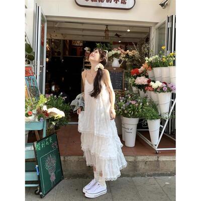 白色吊带连衣裙女夏季甜美蕾丝蛋糕裙海边度假沙滩裙气质显瘦长裙
