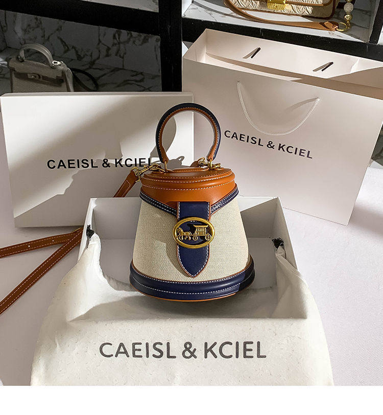 CAEISL&KCIEL品牌正品新款轻奢小众设计简约帆布撞色不规则水桶包怎么样,好用不?