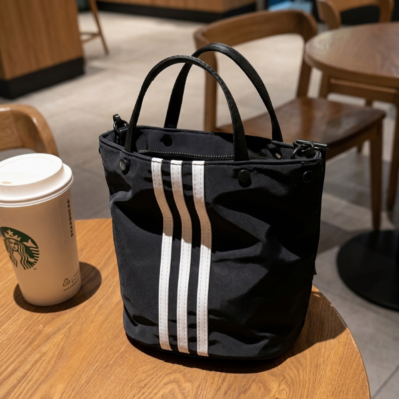小众三条杠手提包休闲百搭水桶包新款牛津布小拎包单肩斜挎包女潮