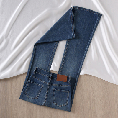 复古蓝加绒高腰微喇牛仔裤女2025