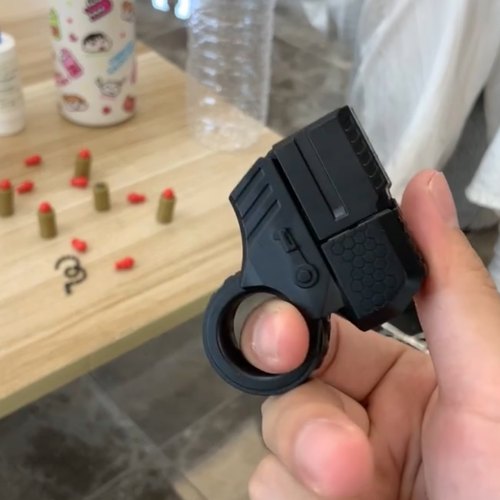 解压指环枪迷你可发射抛壳玩具