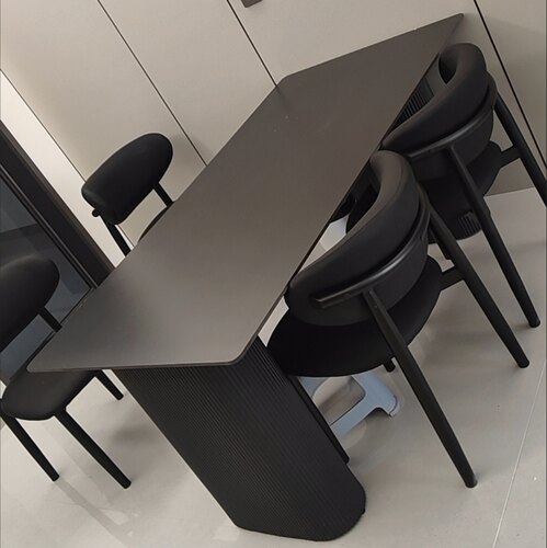 高档纯黑岩板餐桌白色家用餐椅组合高级小户型意式长方形饭桌民宿